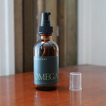 Load image into Gallery viewer, Coriander Seed Omega Body Oil in an amber bottle, essential for nourishing and hydrating skin with omega-3 fatty acids.