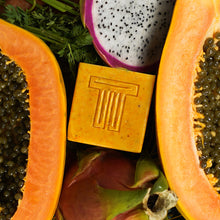Load image into Gallery viewer, Dragon Fruit, Papaya & Carrot Soap displayed between fresh papaya and dragon fruit.
